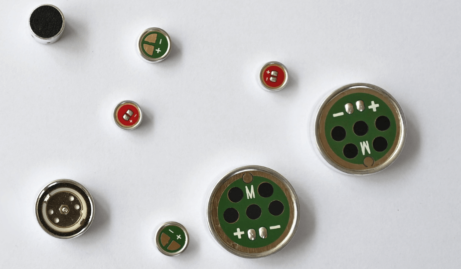 Collection of electret microphone heads showing different models and sizes